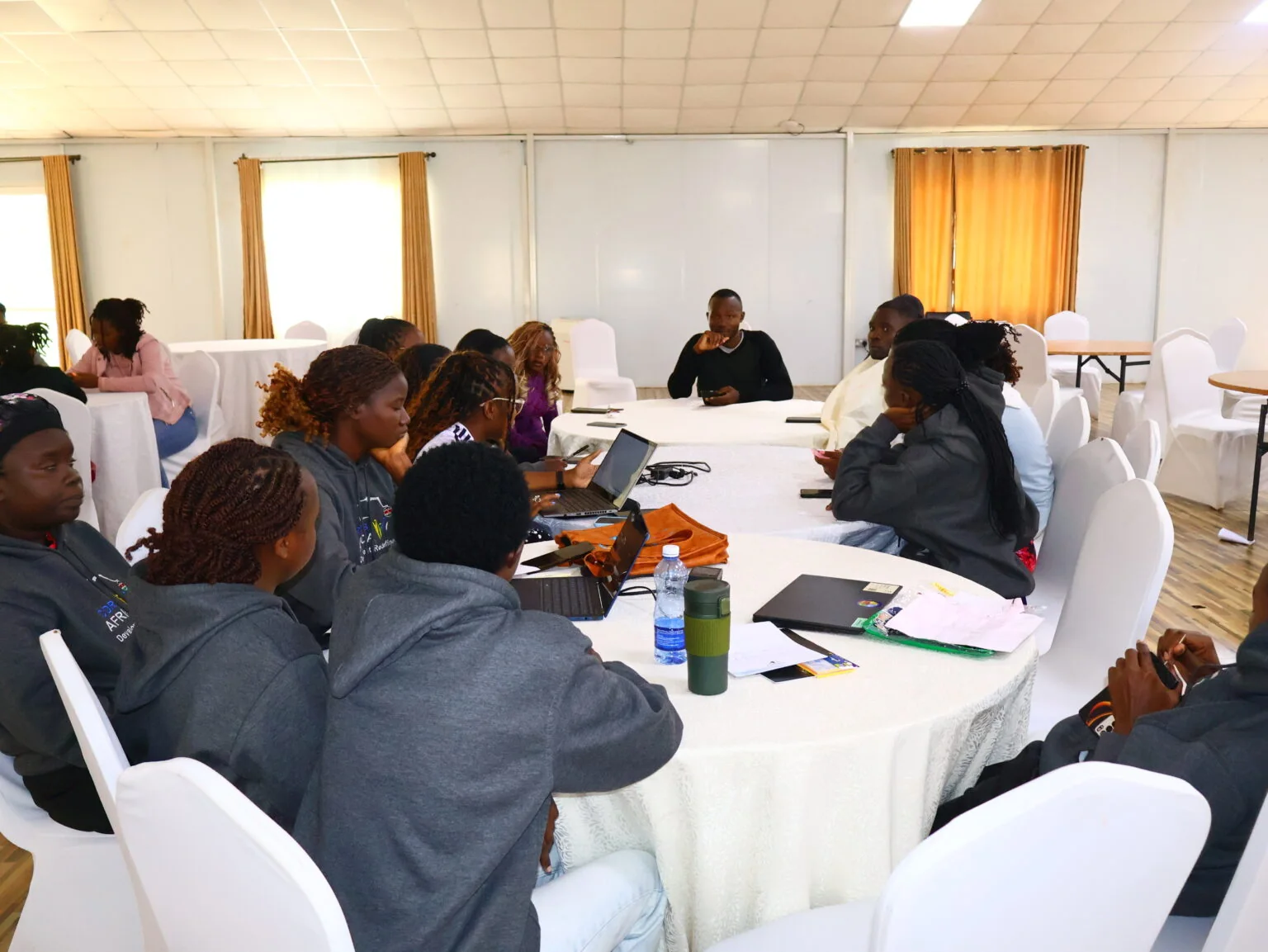Young people working together in a data and planning session